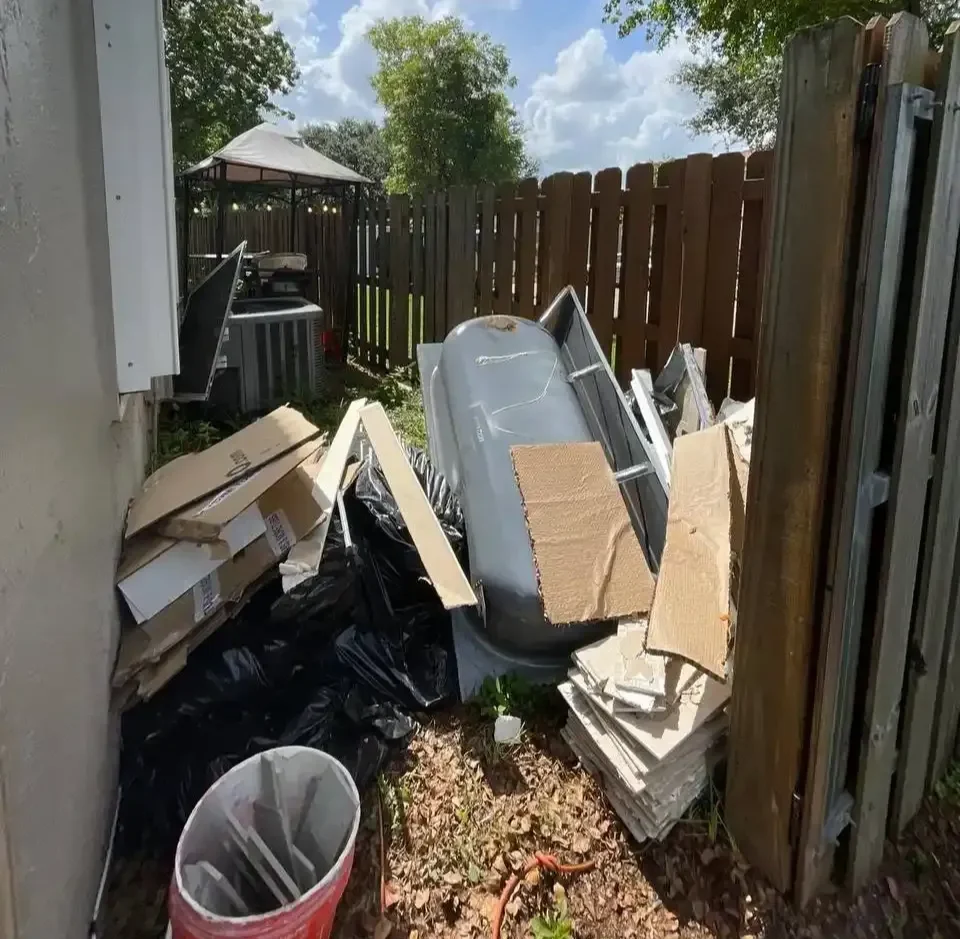 backyard-junk-pile-before-cleanup