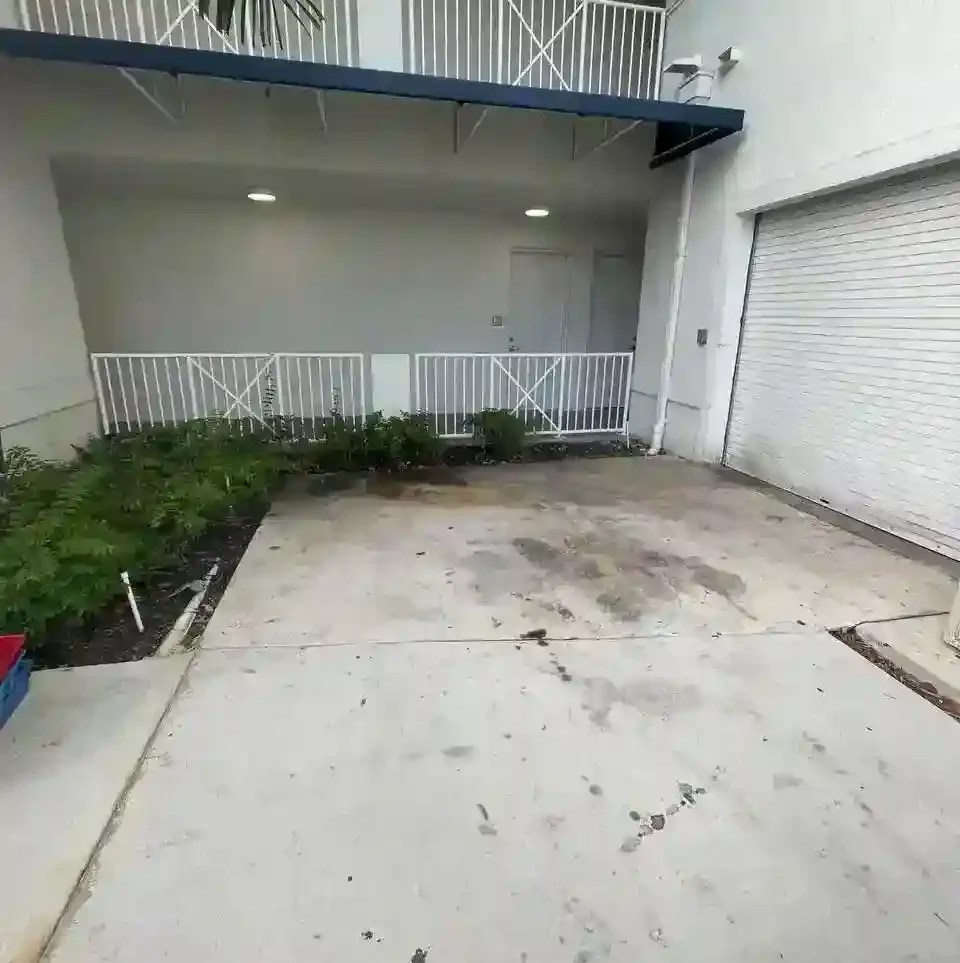 Clean, empty apartment patio after junk removal service cleared all discarded furniture and debris