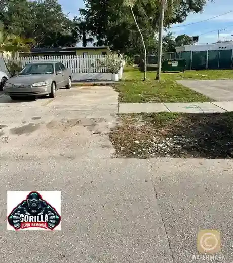 Clean, empty driveway after junk removal service cleared away bulky furniture and debris for a tidy, usable space